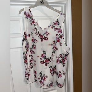 White floral print sleeveless blouse from Maurice’s